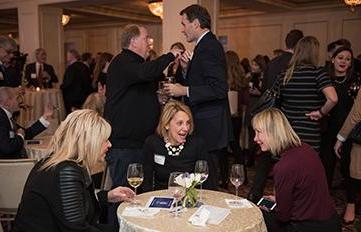Image of Alumni Networking at a University of New Hampshire event